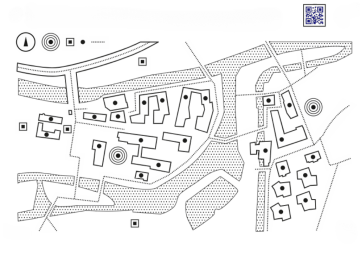 This is a tactile map featuring a layout of a town or area with buildings and roads. The map includes multiple irregular-shaped building footprints and roads marked by solid and dashed lines. Dotted areas represent different textures or terrains. There are various symbols, such as circles and squares with dots in the center, likely indicating key landmarks or points of interest. In the top left corner, a legend shows a compass for orientation and a set of symbols explaining map features. A QR code is positioned in the top right corner.