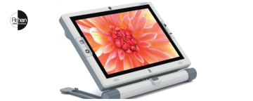 Looky Tab 10 electronic magnifier by Rehan Electronics, shown on its stand with a large 10-inch display screen featuring a vibrant close-up of an orange and pink flower.
